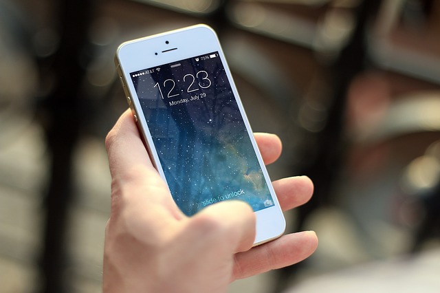 Holding a Iphone