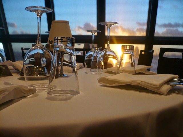 Wineglasses on a table with a sunset